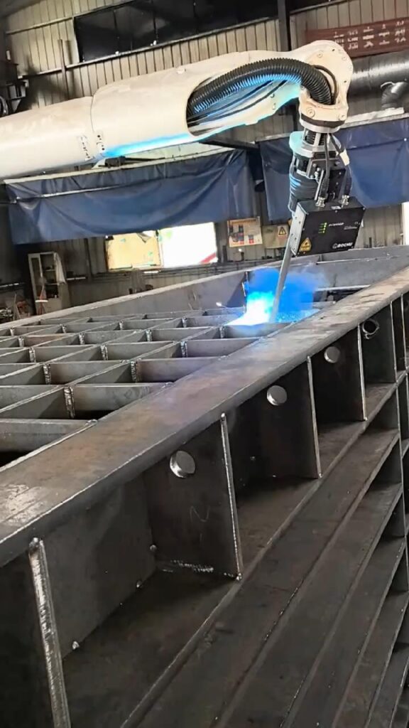 Robotic welding at HUAXIN scrap metal recycling machine factory